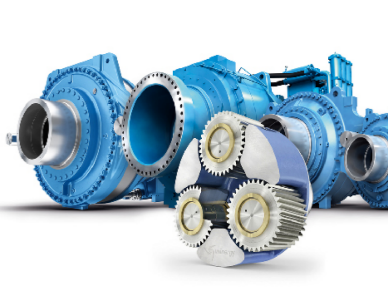 Heavy-duty cylindrical roller bearings supporting gear shafts in an industrial gearbox.