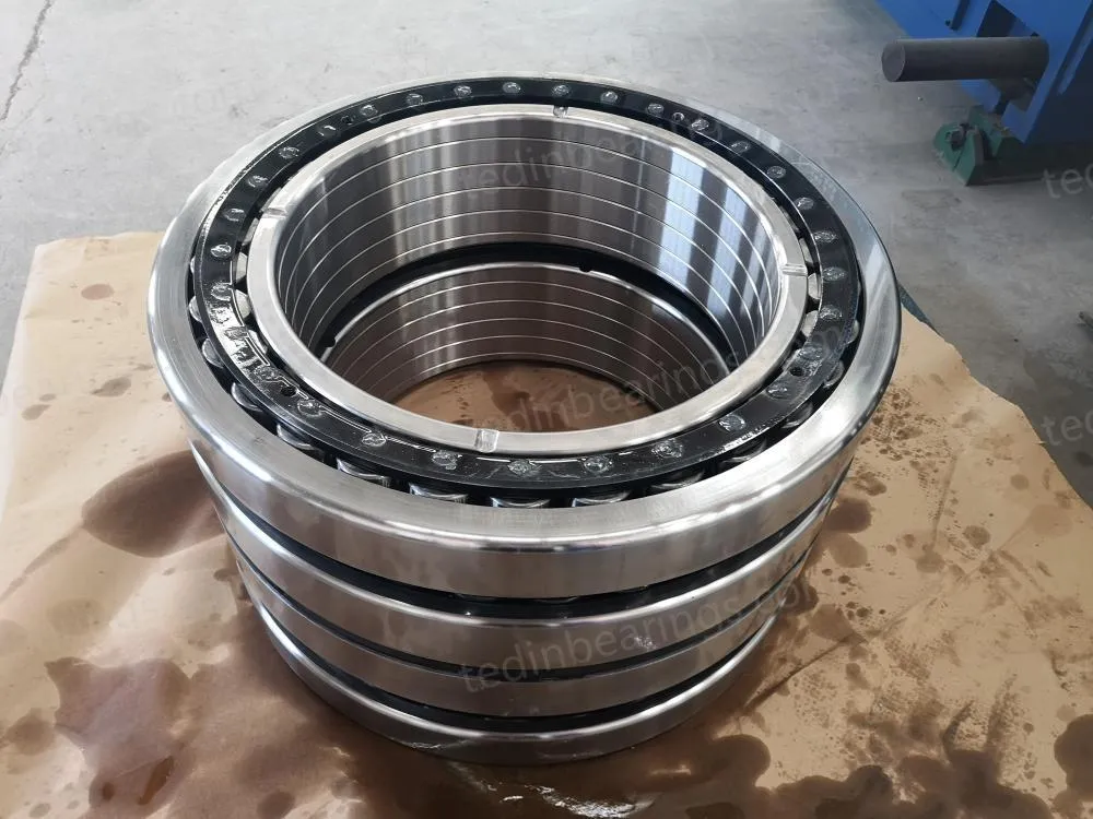 Four row tapered roller bearing for rolling mill roll necks