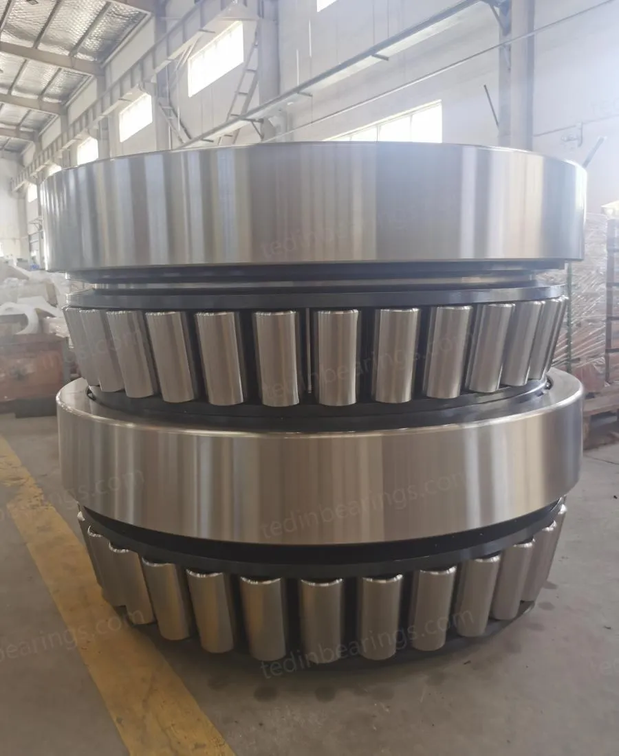 Four row tapered roller bearings used in rolling mill roll neck applications