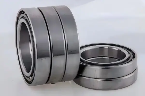 Ball screw support bearing for CNC machine tool feed drive system