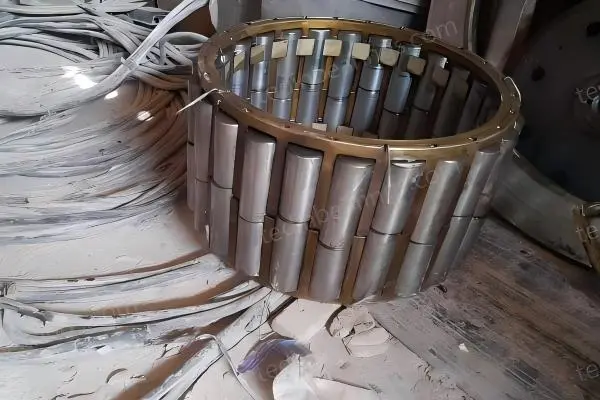 Close-up view of failed main bearing from Cedarapids RC54 cone crusher