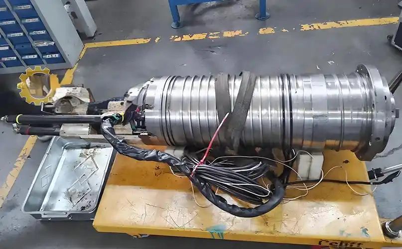 Common symptoms of CNC spindle bearing failure including vibration overheating and noise